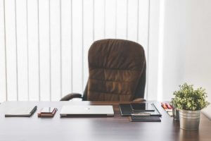 Picture of an empty seat at an office desk